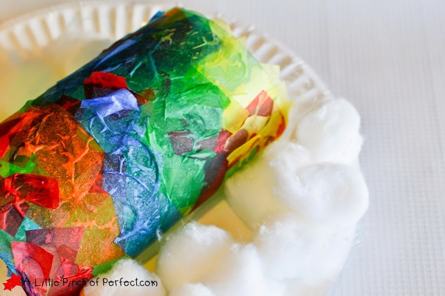 Rainbow Soda Bottle Craft for Kids: An easy and cute recycled craft to make with kids using tissue paper and glue.