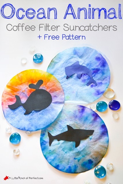 Ocean Animal Coffee Filter Suncatcher Craft for Kids + free template: We used coffee filters and cut out animal silhouettes like a dolphin, shark, whale, and fish to make colorful suncatchers perfect for summer or ocean activities with the kids. 