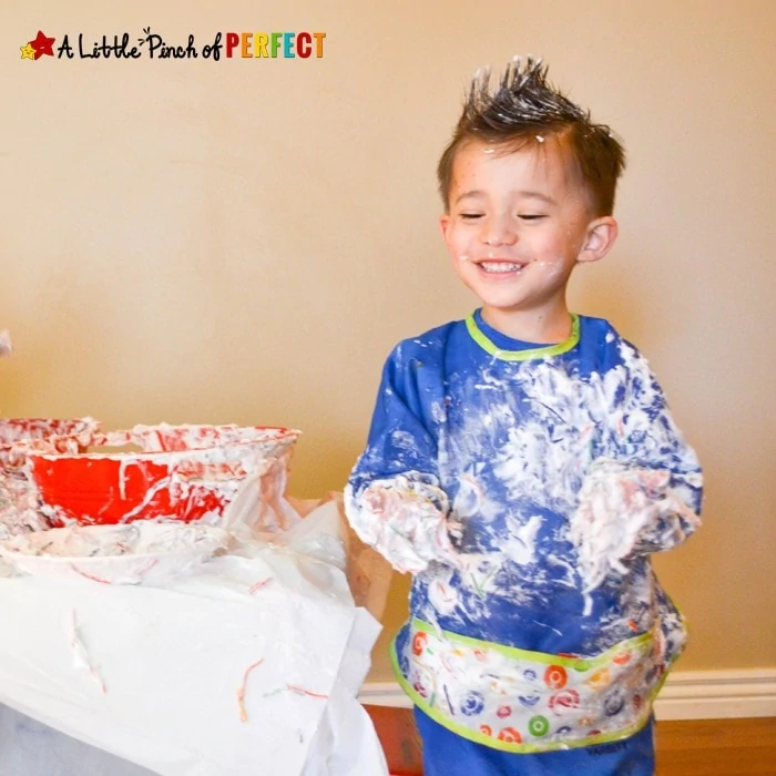 Rainbow Noodles and Fluffy Clouds Sensory Activity: Shaving Cream Sensory fun perfect for spring, learning about weather, or having some St. Patrick's Day fun with the kids.