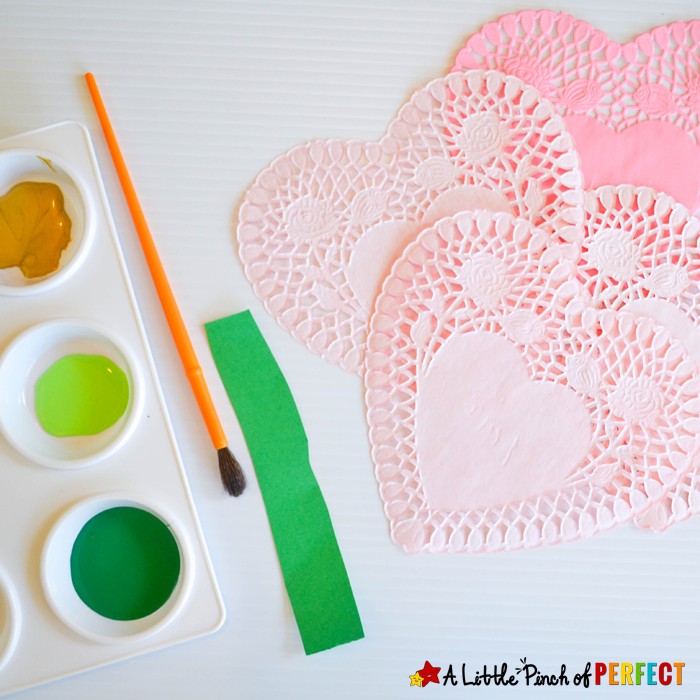 Lovely St. Patrick’s Day Shamrock Craft for Kids: Easy to make four leaf clover craft with doilies or paper hearts