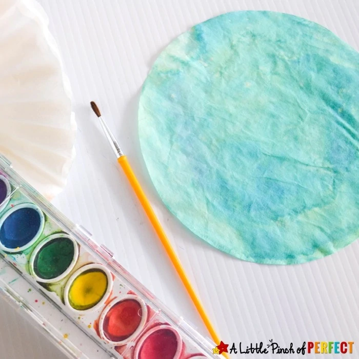 Earth Day Coffee Filter Suncatcher Craft for Kids: An easy craft to make while learning about the Earth, Planets, Solar system, and celebrating Earth Day.