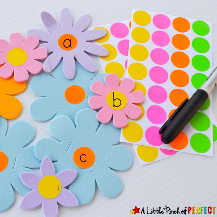 ABC Letter Matching Flowers Activity: Kids can have fun matching flowers and stems to make a garden. We matched uppercase and lowercase letters but you could always adapt this activity to learn numbers, spelling, and more. (spring, language, preschool)
