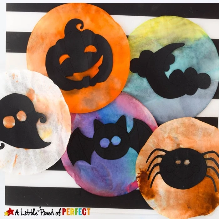 Halloween Shadow Suncatcher Craft for Kids and Free Template: Kids can choose from 6 silhouette templates (jack-o-lantern, bat, ghost and more) or make their own Halloween design to hang on the window and watch it glow. (Kids craft, coffee filter, free printable)