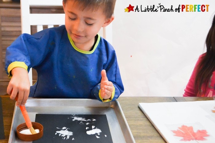 Happy Halloween Ghost Handprint Kids Craft: These little handprint ghosts look like they are saying, "Boo!" (Kids art, Toddler, Preschool, kindergarten)