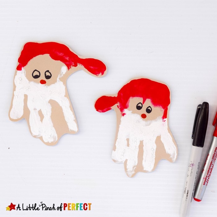 Handprint Santa Craft: An Adorable Christmas Decoration for Kids to make that can be hung on the walls, turned into a card, or made into an ornament.