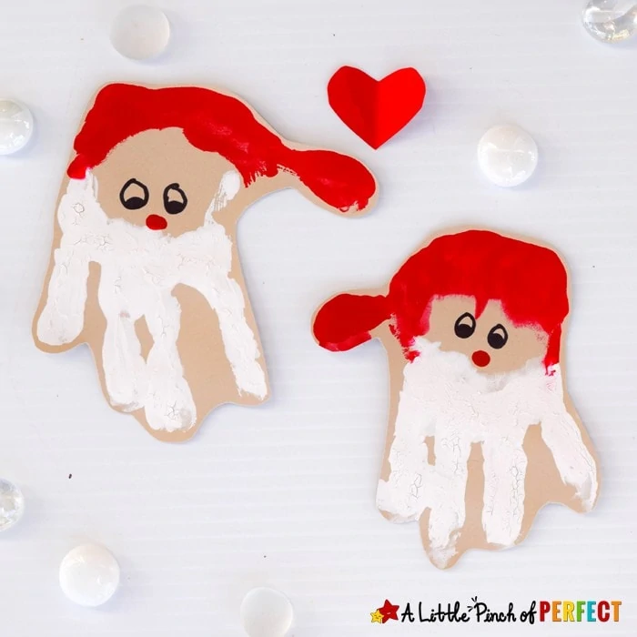Handprint Santa Craft: An Adorable Christmas Decoration for Kids to make that can be hung on the walls, turned into a card, or made into an ornament.
