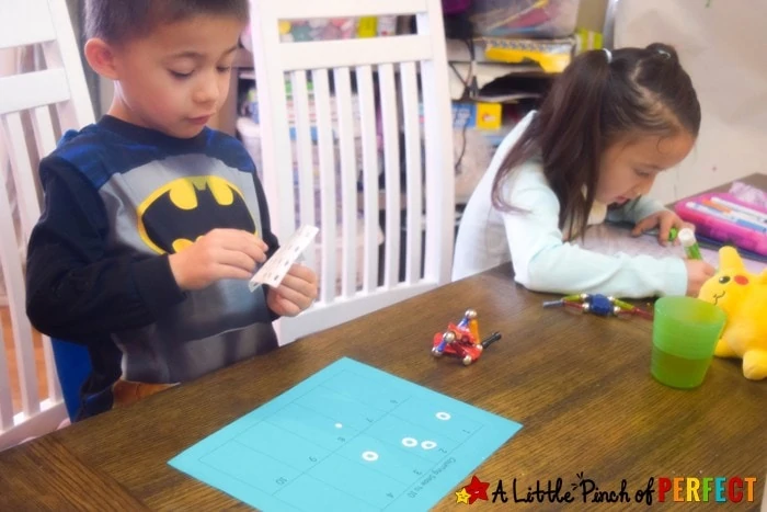 As kids count numbers 1-10 or 1-20 they can practice one-to-one correspondence, number recognition, and fine motor skills using stickers and this free printable activity that's perfect for a winter day of learning (there are 4 different pages to choose from).