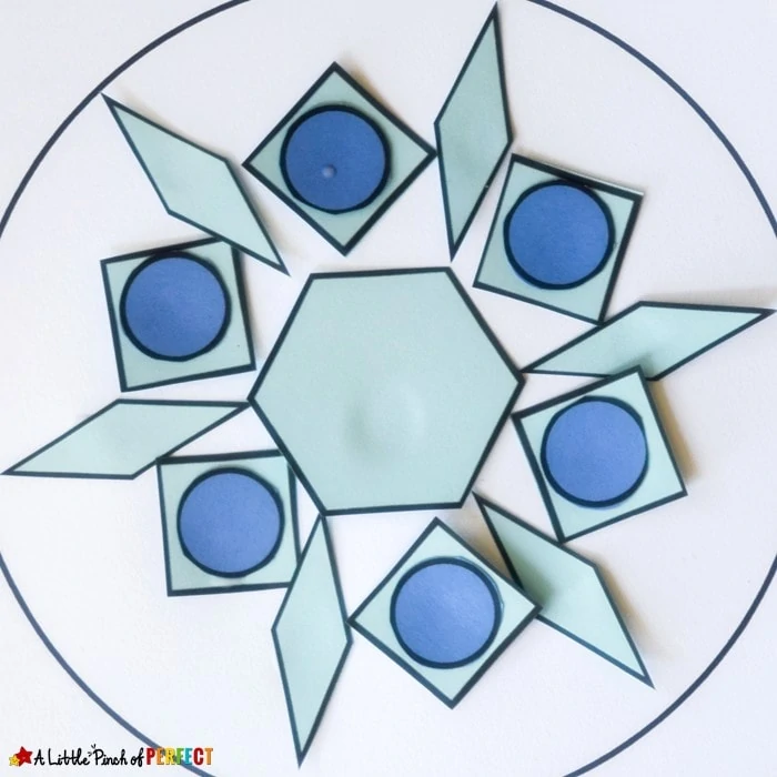 Build a Snowflake Winter Shape Math Activity and Free Printable: Kids can make beautiful snowflakes as they learn and craft with shapes. The free printable includes build and count mats, shapes, and tangrams. (Preschool, Kindergarten, First Grade, STEAM activity)
