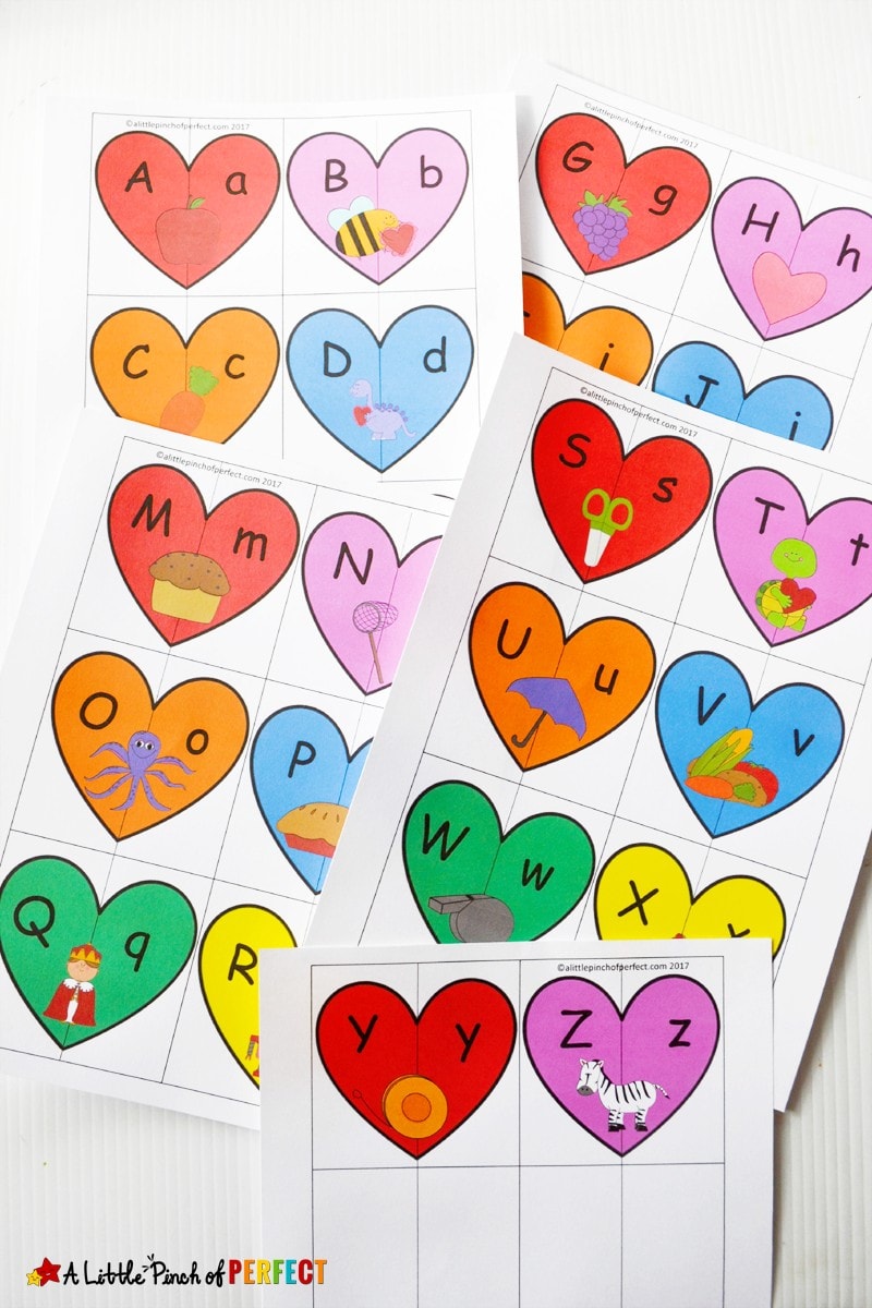 Valentine's Heart Letters and Phonics Puzzles Free Printable: Kids will learn uppercase and lowercase letters and associate pictures with each letter like an apple for the letter A and a bee for the letter B. (preschool, kindergarten, February, hands on learning)