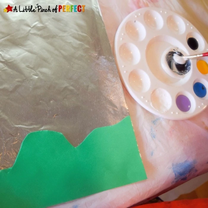 Easy stormy weather craft inspired by Thunder Cake is so cool because the clouds, rain drops, and flashes of lightening shine on the page. (painting, preschool, kindergarten, spring, summer, learning about weather, book extension)