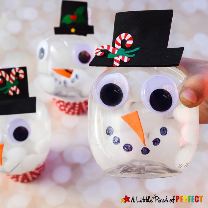 Kids can make a Snowman snow globe craft with our clever way of turning a recycled bottle into an adorable craft using our latest favorite winter themed sensory supply.