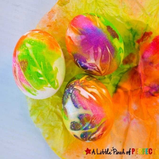 Coffee Filter Tie Dye Easter Eggs: A cool way to give your eggs lots of cool color. Fun for adults and kids and eggs are edible when done. (#eastereggs #kidscraft #kidsactivity)