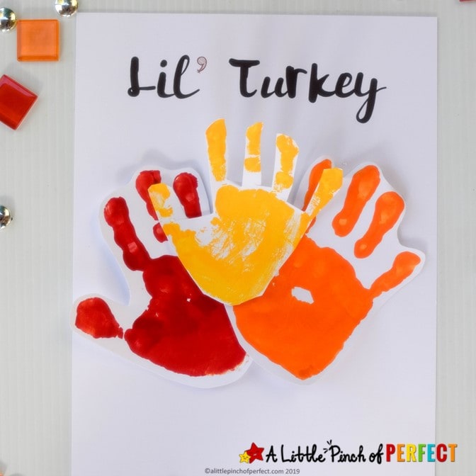 This Lil' Turkey Handprint Craft includes a Free Template and is perfect for making Thanksgiving memories with kids. (#preschool #toddleractivities #Thanksgiving #craft #kidsactivity)