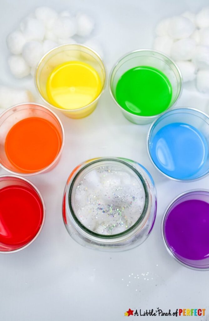 Follow these easy directions to make a Rainbow Jar with kids or anyone who loves rainbows (teens, and adults included). The rainbow jars look beautiful. This craft is perfect for spring, including in a science weather unit, learning about absorption, or having some St. Patrick's Day fun. (#kidscraft #kidsactivity #craft #masonjar #stpatricksday)