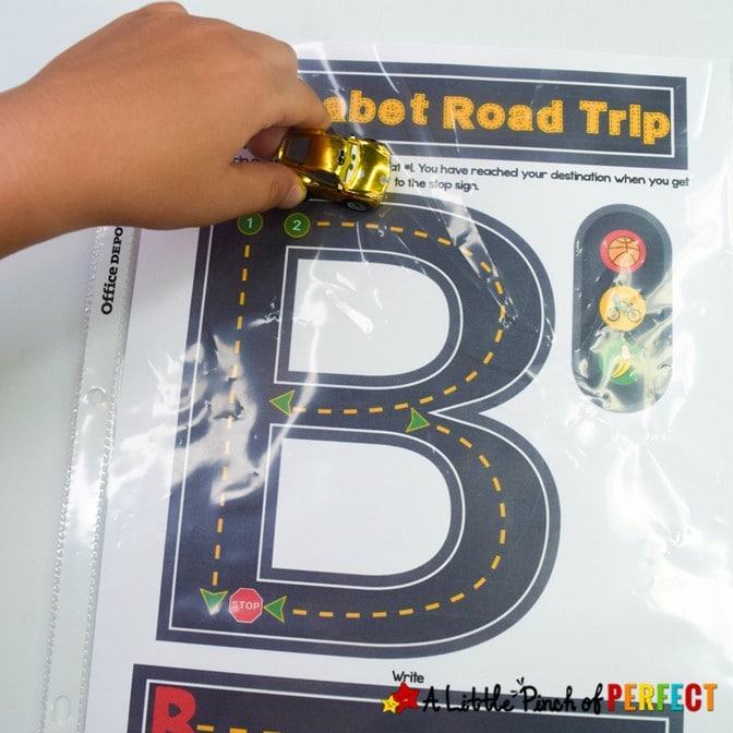 This amazing set of alphabet roads mats provides a fun way for children to learn write letters. They include a practice page, tracing lines, guiding arrows and stop signs, and phonics pictures for bonus learning. (#preschool, #kindergarten, #alphabet, #kidsactivities #homeschool #languagearts)