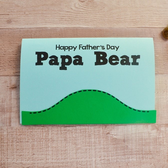 Children can make a cute Papa Bear handprint card with our free craft template and step-by-step directions for Father's Day. #fathersday #card #kidsactivity #kidscraft