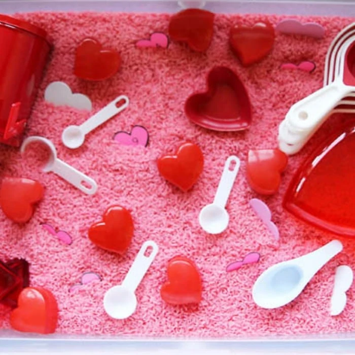 Sweet Valentine’s Day Sensory Bin - Living Montessori Now
