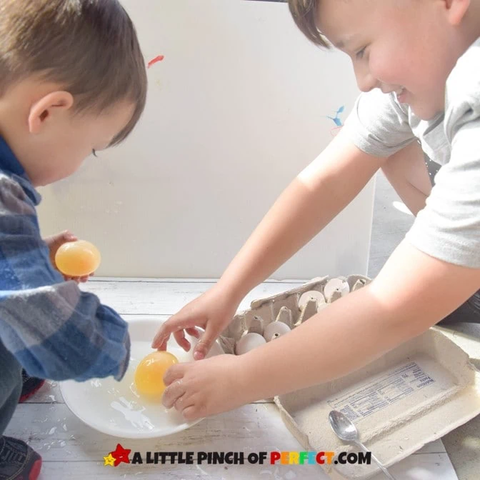 Two children playing with the bouncy eggs after science experiment. #Scienceexperiment #kidsactivity #homeschool