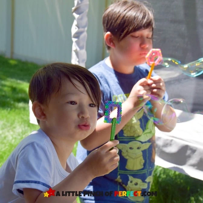 Blowing Bubbles with Homemade Bubble Wand: Directions and Supply List