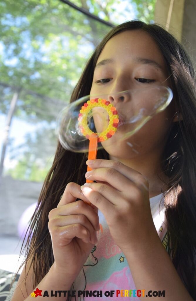 Blowing a Bubble with DIY Bubble Wands