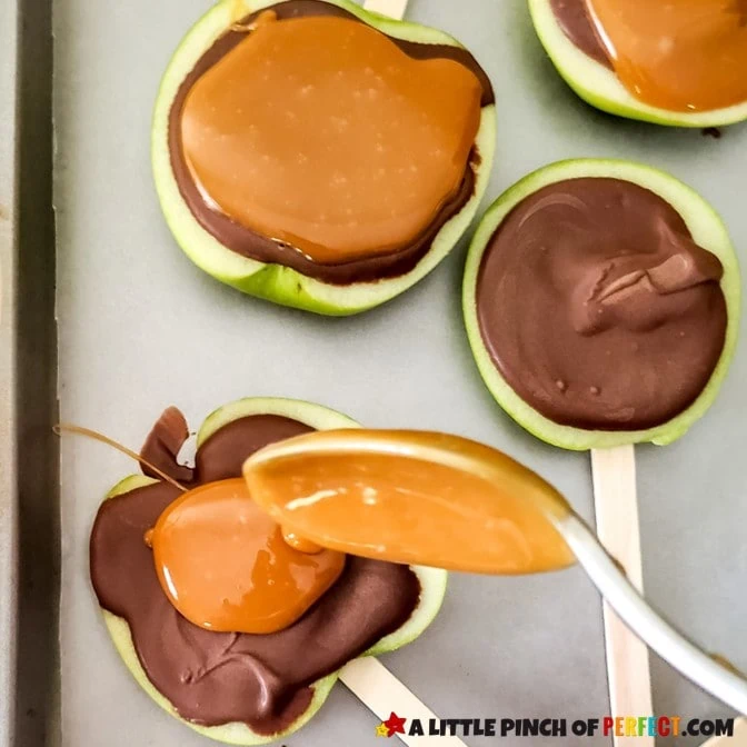 Spread Caramel Sauce on top of the apple slices