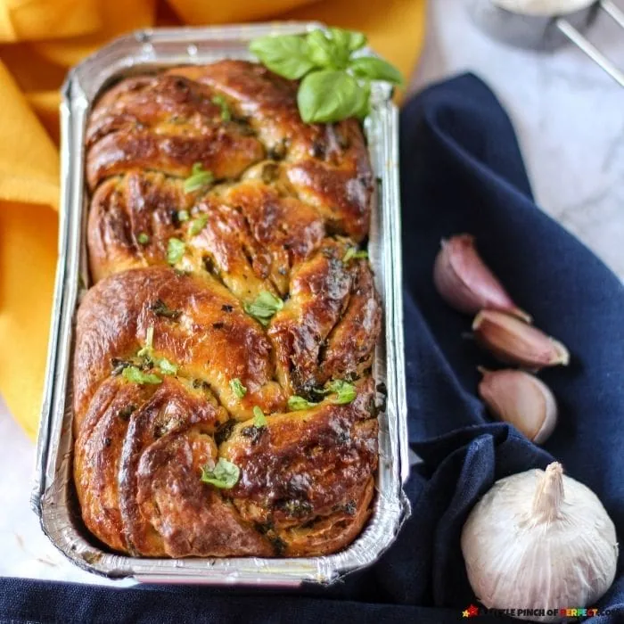 Complete your dinner with this divine Garlic and Herb Swirl Bread Recipe that’s the perfect side to any meal. #recipes #familyrecipes #garlicbread 