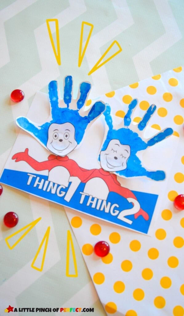 Make a Thing 1 and Thing 2 handprint craft inspired by Dr. Seuss and the Cat in the Hat. Grab the free template and directions to make this EASY and CUTE craft. #kidsactivity #craft #preschool 