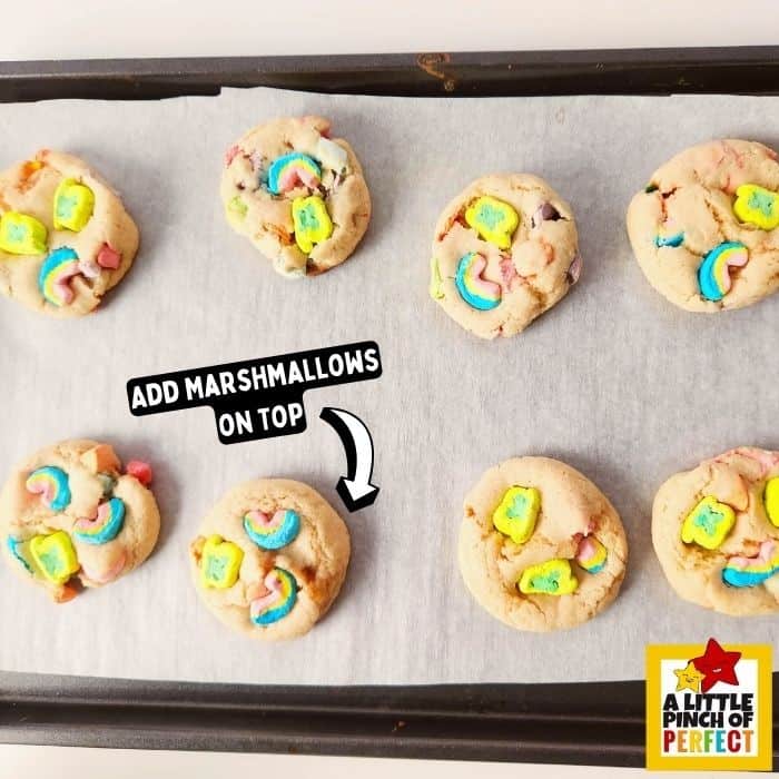Celebrate St. Patrick's Day with these delicious Lucky Charms cookies. A magical treat filled with rainbows and clovers that the whole family will love! #recipe #cookie #luckycharms #stpatricksday