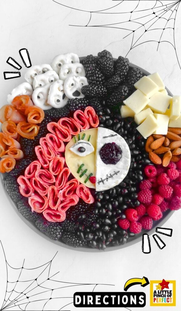 This Jack and Sally Halloween Charcuterie Board is the perfect spooky snacks for your Halloween party or movie night with the family. #halloween #nightmarebeforechristmas