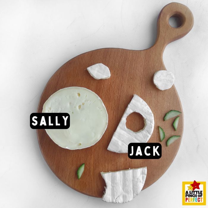 This Jack and Sally Halloween Charcuterie Board is the perfect spooky snacks for your Halloween party or movie night with the family. #halloween #nightmarebeforechristmas