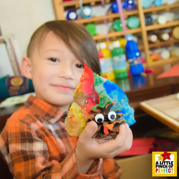 Thanksgiving Turkey Pinecone and Leaf Craft: A FUN Nature Craft for Kids a DIY activity that's simple, budget-friendly, and brings festive cheer to your home or classroom.
