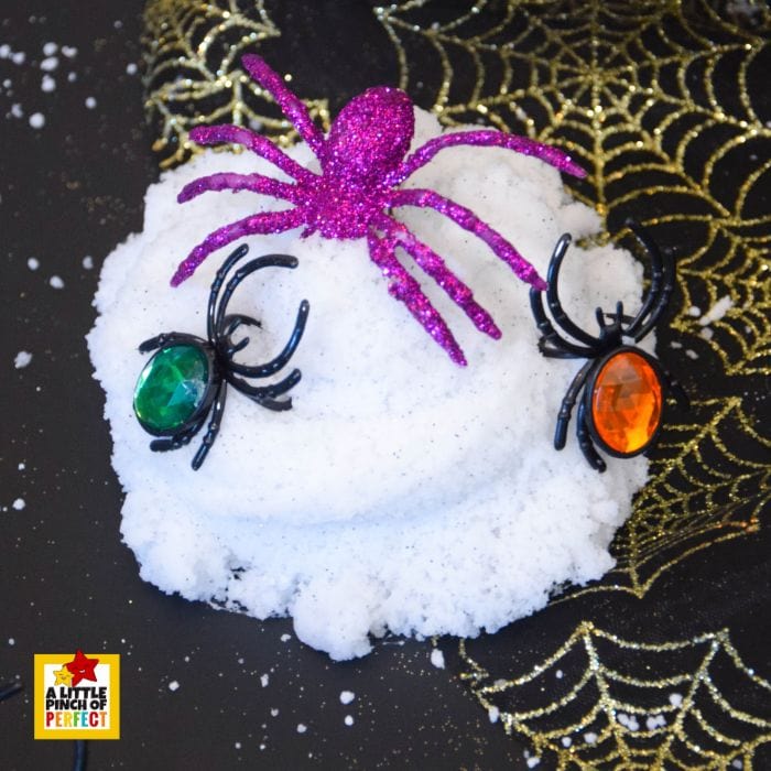 Learn how to make the spookiest spiderweb slime recipe for kids! This easy Halloween slime uses Insta Snow for a stretchy web effect and is extra fun with toy spiders.