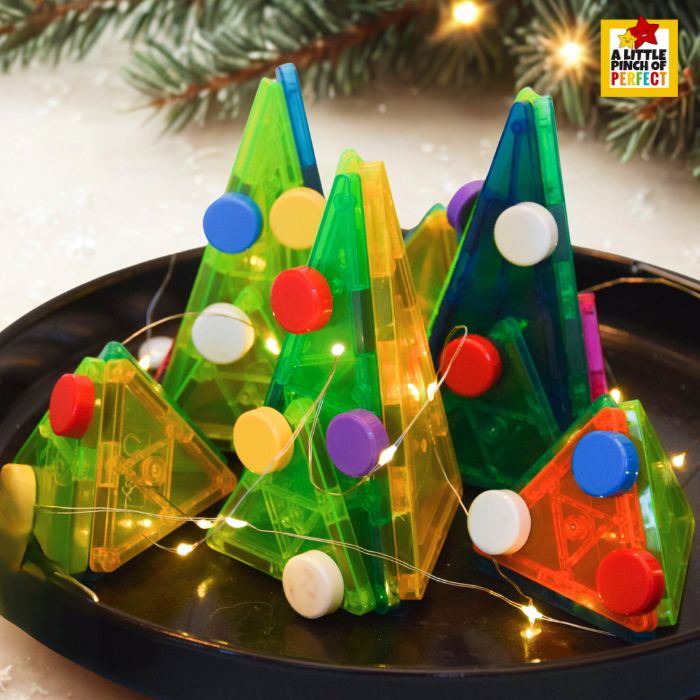 Glowing Magna-Tile Christmas Tree decorated with magnets and LED lights.