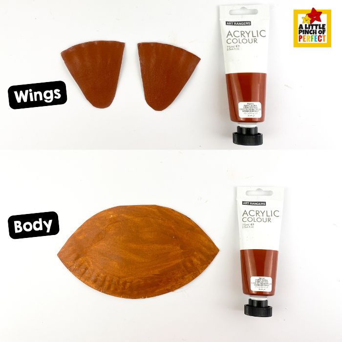 painting paper plate brown to make the turkey’s body and wings