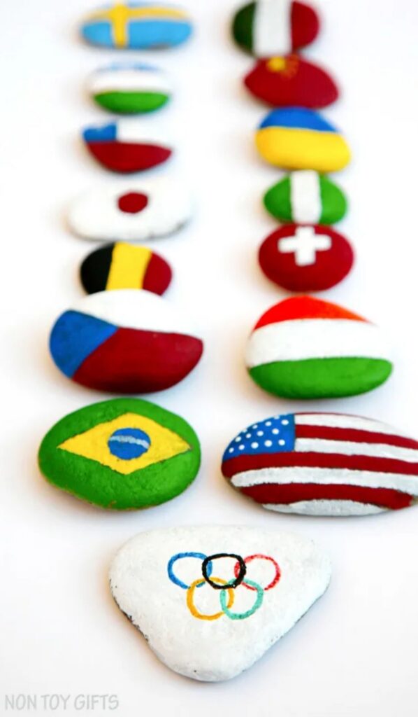 Olympic Activities for Kids: Painted flag rocks craft showing different country flags