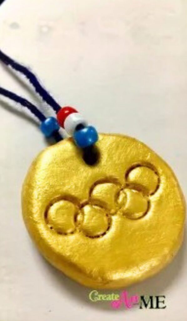 Olympic Activities for Kids: Handmade Olympic medal craft made with air dry clay