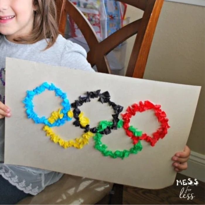 Olympic Activities for Kids: Tissue paper Olympic rings craft with bright layered colors