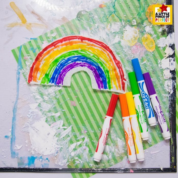 Coffee Filter Rainbow Leprechaun Craft for St. Patrick&rsquo;s Day (+ Hat Template) step-by-step: coloring the coffee filter with markers