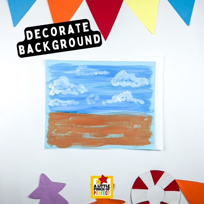 Sandcastle Art Project for Kids &ndash; Creative beach scene made from paper pieces and craft sand for a textured seaside masterpiece.