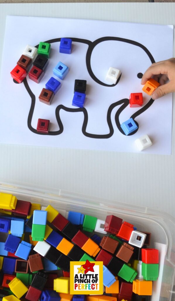 Elmer the Elephant Fine Motor Activity: Patchwork Cube Building (Free Printable) &ndash; Child using colorful linking cubes to decorate a printable elephant, creating patterns while strengthening fine motor skills.