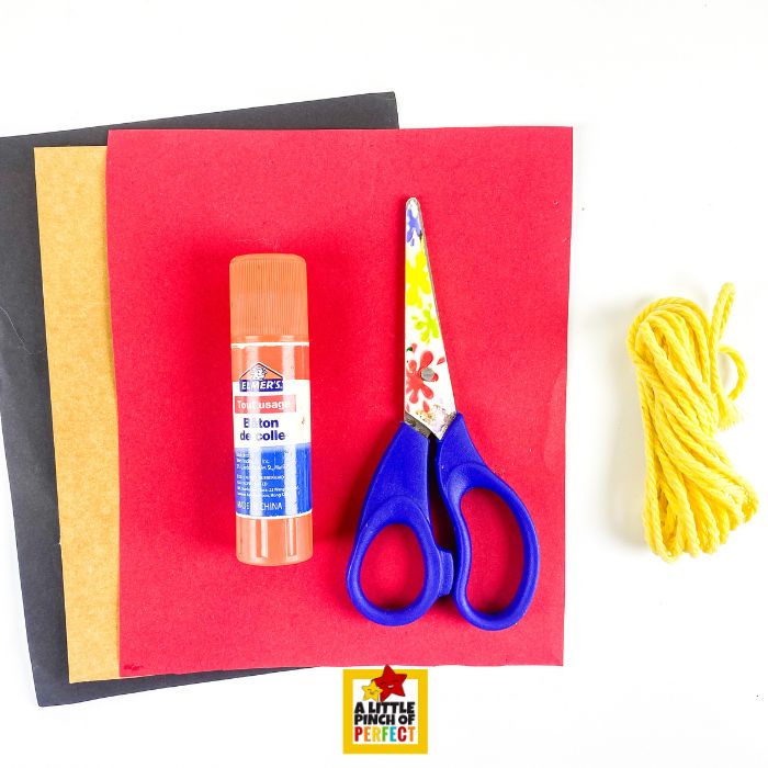 Yarn Wrapped Pencil Craft for Kids &ndash; Supplies needed to make this easy back-to-school craft, including the free printable pencil template, cardstock paper, yarn, school glue, and scissors.