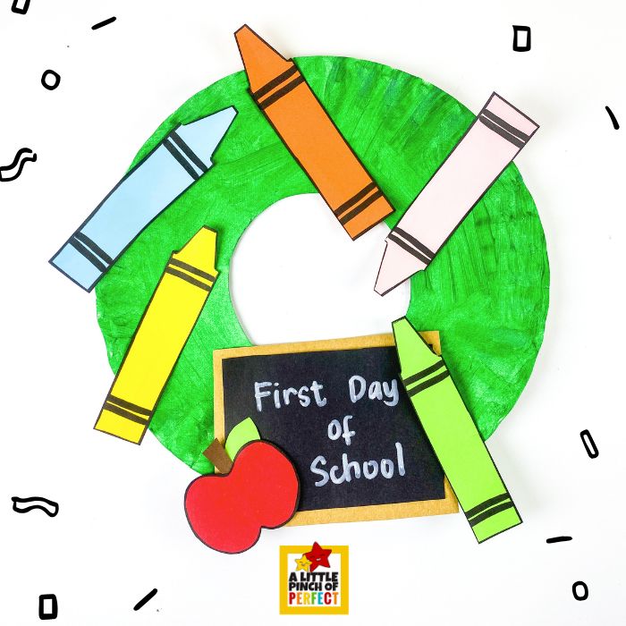 Back to School Paper Plate Crayon Wreath Craft and Template &ndash; Grab some crayons, paper, and a paper plate for this colorful first day of school activity.