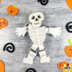 Paper Chain Skeleton Craft for Kids with Template – fun paper skeleton craft kids can make for Halloween using a printable template
