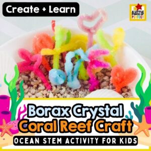 Borax Crystal Coral Reef Craft for Kids (Easy Ocean STEM Activity) completed crystal coral reef made with Borax crystals, pipe cleaners, sand, and ocean animal figures in a colorful underwater habitat.