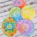 Beautiful Easter Egg Doily Craft for Kids Inspired by Rechenka's Eggs: An easy step-by-step tutorial showing how kids can make Easter Eggs that look intricately decorated like the ones straight out of Patricia Polacco’s book.